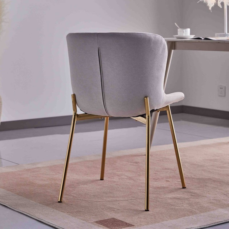 Juego de 4 Sillas con Estructura de Madera Tapizadas en Color Gris Claro y Patas Acabado Dorado - Medidas 50x54x81 cm